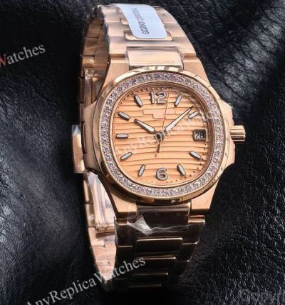 RRR Factory Patek Philippe Nautilus Cal.E 23-250SC Movement 32mm Champagne Face Rose Gold Band Women Watch